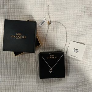 Brand new with tags Silver with gold accent Coach “C” necklace